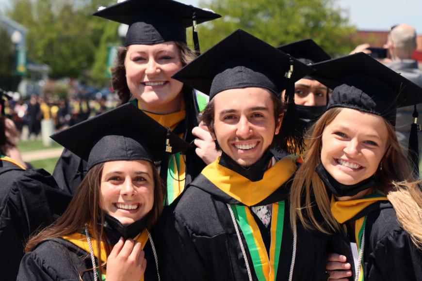 group of graduates in caps and gowns